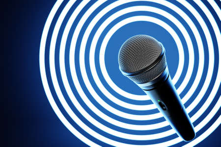 microphone, round shape model o neon background, realistic 3d illustration. music award, karaoke, radio and recording studio sound equipmentの写真素材