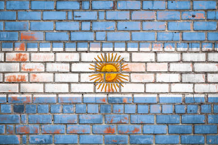 Argentina flag on a grunge brick background.の写真素材