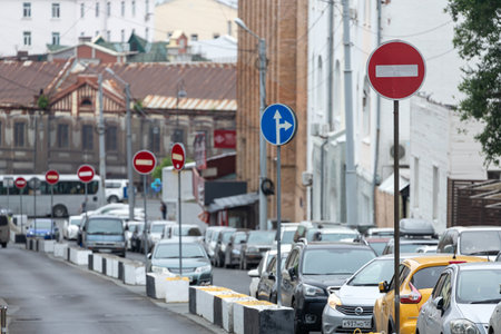 Vladivostok, Russia - July 14, 2022: city street with different cars, taxi , rod signのeditorial素材