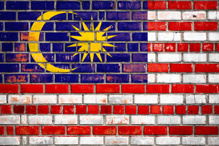 National flag of the Malaysia on a grunge brick background.の写真素材