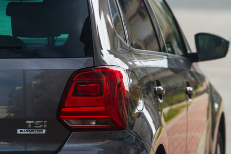 Side, Turkey -January 21, 2023: Volkswagen Polo, close up detail on one of the LED red taillight modern blue car. Exterior detail car.のeditorial素材