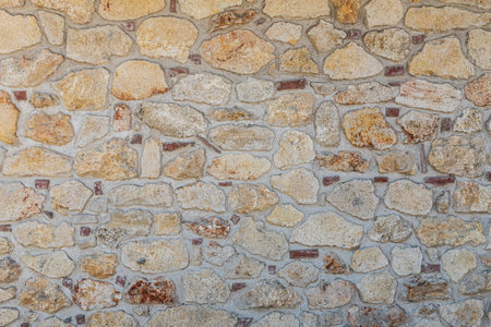 close up of the walls made of stone , stone background.の写真素材