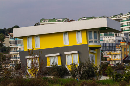 Side, Turkey -January 22, 2023: Unusual architecture. Gray-yellow stone upside-down house. Children's attractionsのeditorial素材