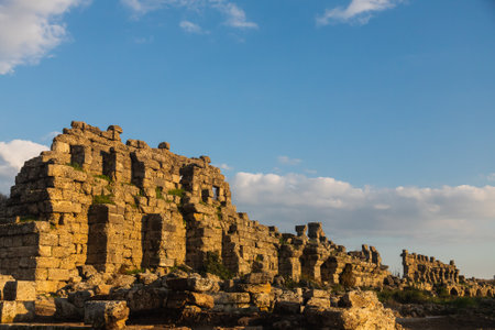 An antique ruined city of columns.Ruin. View of the ancient city in Side, Turkey.のeditorial素材