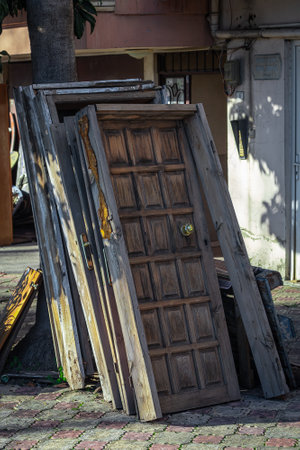 Close-up of old wooden doors at a construction siteの写真素材