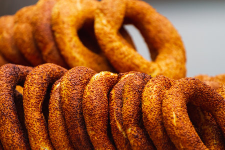 Traditional turkish bagels on a showcase. Sesame encrusted pastryの写真素材