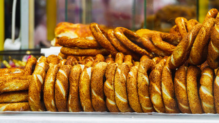 Traditional turkish bagels on a showcase. Sesame encrusted pastryの写真素材