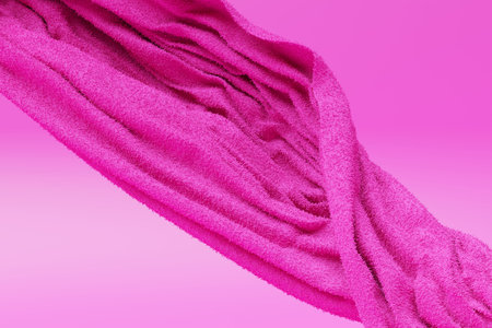 3d illustration of pink glowing color lines. red cloth line on monochrome isolated backgroundの写真素材