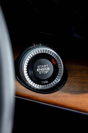Car engine push start stop button ignition remote starter. car dashboardの写真素材