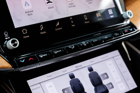 Novosibirsk, Russia - April 25, 2023: black Jeep Wagoneer , interior with visible climate controls, adjustment of the fragment of instrument panel.のeditorial素材