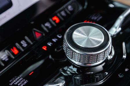 Novosibirsk, Russia - April 25, 2023: black Jeep Wagoneer Close up shot of modern central console...