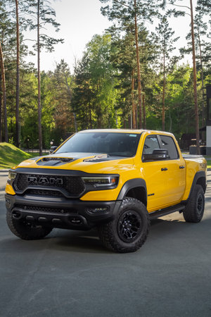 Novosibirsk, Russia - June 01, 2023: yellow Dodge Ram Trx Havok Edition, pickup parked in park, front viewのeditorial素材