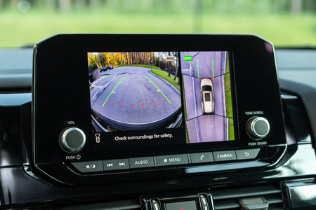 Novosibirsk, Russia - August 23, 2023: white Nissan Pathfinder Rock Creek SUV , reverse camera with monitor,buttons - details and controls of modern car.のeditorial素材