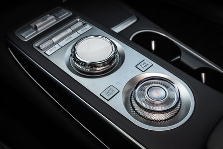 Novosibirsk, Russia - August 29 , 2023: black Hyundai Genesis, close-up of off road, parking brake,...