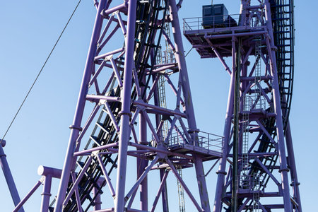 Roller coaster with twists, turns, cave, loops in amusement park