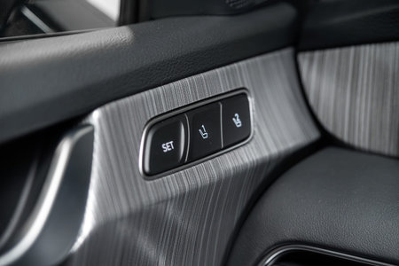 Novosibirsk, Russia - February 13, 2024: white Hyundai Palisade, close-up of silver of seat setting...