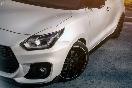 Novosibirsk, Russia - April 23, 2024 : white Suzuki Swift, Mock-up, banner for car advertising....