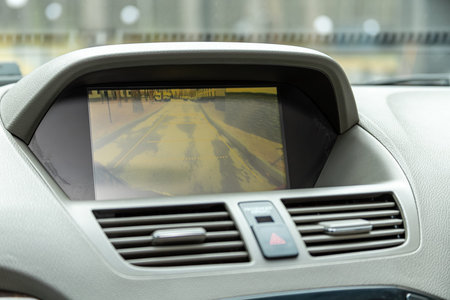 Novosibirsk, Russia - April 01, 2024: gray Acura MDX, reverse camera with monitor,buttons - details...