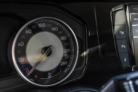 Novosibirsk, Russia - April 13, 2024: gray Volkswagen Touareg, close-up of the dashboard, speedometer with white backlight. modern car interiorのeditorial素材