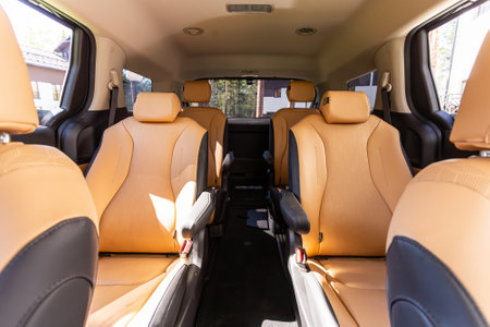 Novosibirsk, Russia - July 10, 2024: Kia Carnival, comfortable passenger seat made of beige leatherのeditorial素材