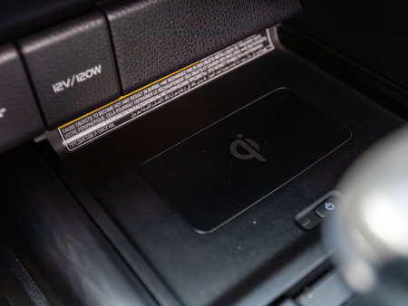 Novosibirsk, Russia - July 10, 2024: Toyota Camry, wireless car chargerのeditorial素材