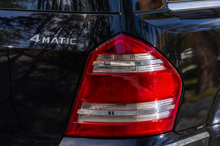 Novosibirsk, Russia - July 10, 2024: Mercedes-Benz GL-class, view of modern car xenon lamp taillight, bumper, rear trunk lid. Exterior of a modern carのeditorial素材