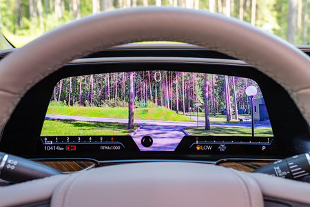Novosibirsk, Russia - July 10, 2024: Cadillac Escalade, digital car speedometer. Close up shot of...