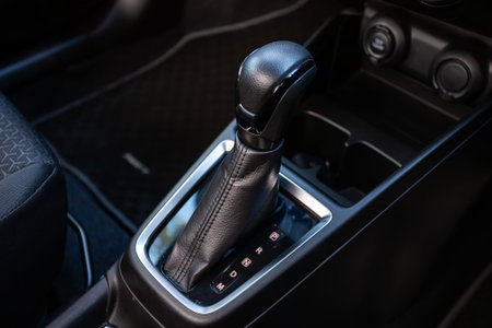 Novosibirsk, Russia - July 10, 2024: Suzuki Swift, Accelerator handle and buttons in a new car.