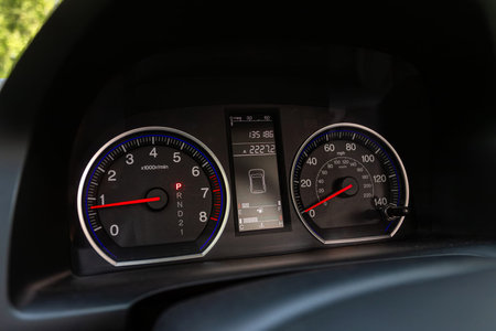 Novosibirsk, Russia - August 05, 2024: Honda CRV, Car dashboard with white backlight: Odometer,...