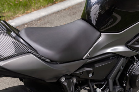 Novosibirsk, Russia - July 10, 2024:Kawasaki Ninja, close-up of a comfortable motorcycle seat for...
