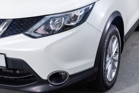 Novosibirsk, Russia - August 10, 2024: Nissan Qashqai, Macro view of modern car xenon lamp...