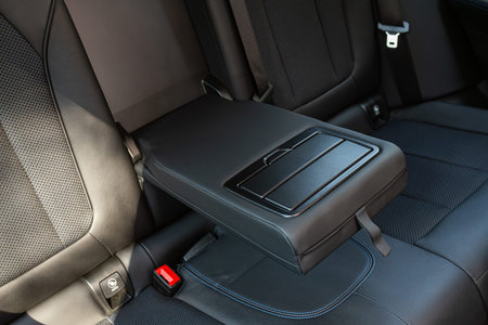 Novosibirsk, Russia - August 10, 2024: BMW X3, Close-up of black armrest