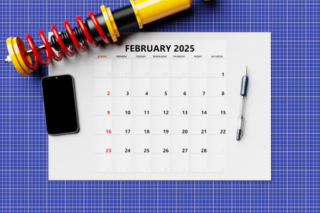 Calendar 2025: February Monthly Planner Template for Corporate Design with Pen, Phone and Car Partsの写真素材