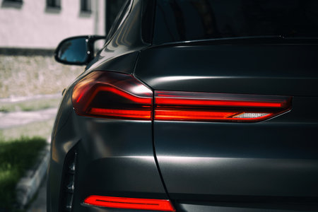 Car taillights. Exterior detail. Close up detail on one of the LED taillights modern car.の写真素材