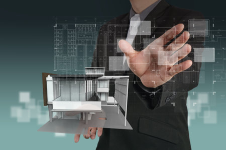 businessman draws building development conceptの写真素材