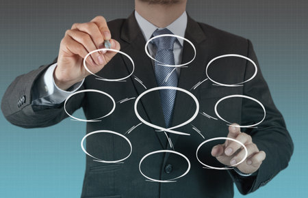 businessman hand drawing an empty diagram
