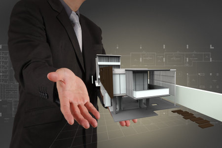 businessman draws building development conceptの写真素材