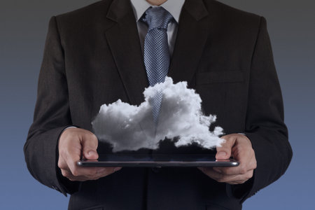 Businessman drawing a Cloud Computing diagram on the new computer interface