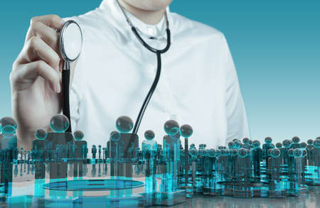 Doctor hand with a stethoscope and human sign socialの写真素材