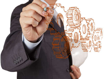 businessman draws gear to success conceptの写真素材