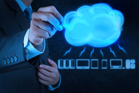 Businessman drawing a Cloud Computing diagram on the new computer interface