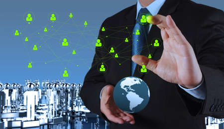 businessman hand pointing to social network as conceptの写真素材