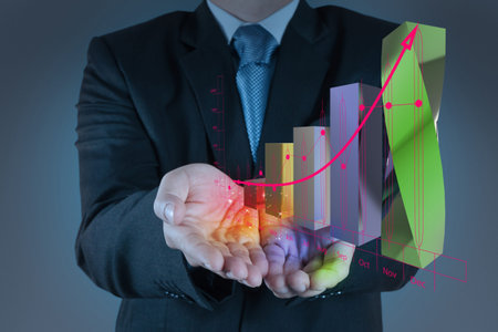 businessman hand working with new modern computer and business strategy as concept