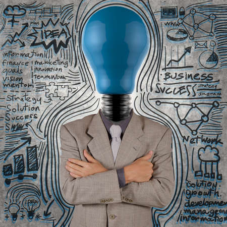 businessman with blue light bulb head as conceptの写真素材