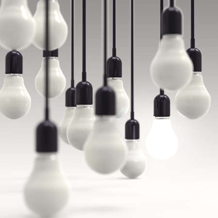 creative idea and leadership concept light bulb on grey backgroundの写真素材