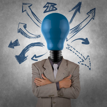 creative businessman with lightbulb head as solution conceptの写真素材