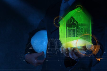 businessman hand shows design house model as construction concept