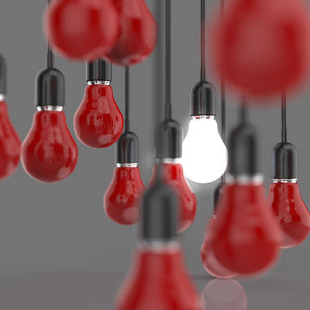 creative idea and leadership concept light bulb on grey backgroundの写真素材