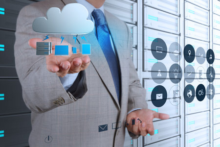 Businessman hand working with a Cloud Computing diagram on the new computer interface as concept