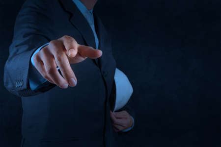 businessman hand pointing the whiteboard or virtual screen and copy spaceの写真素材